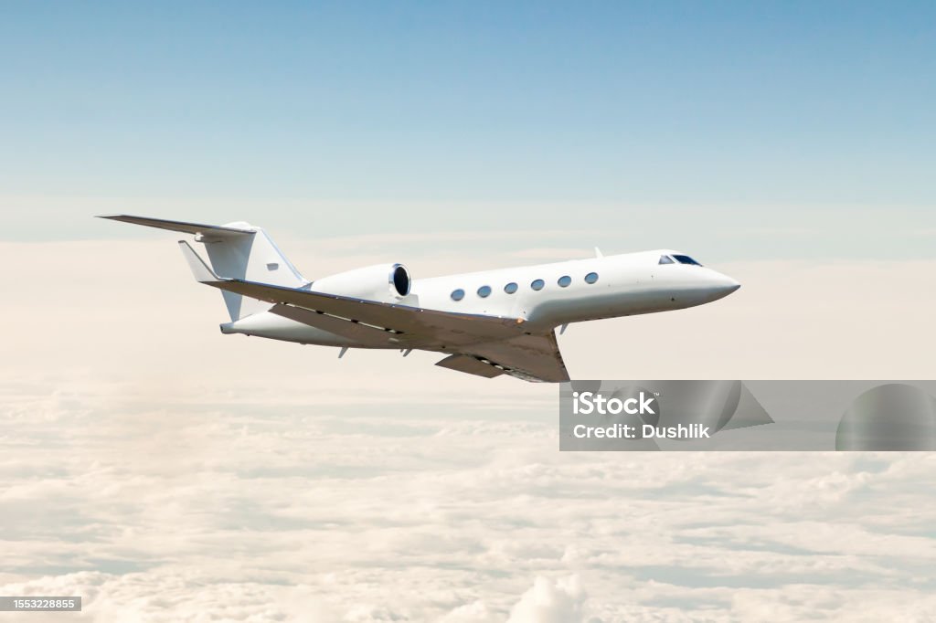 Jet in flight over clouds
